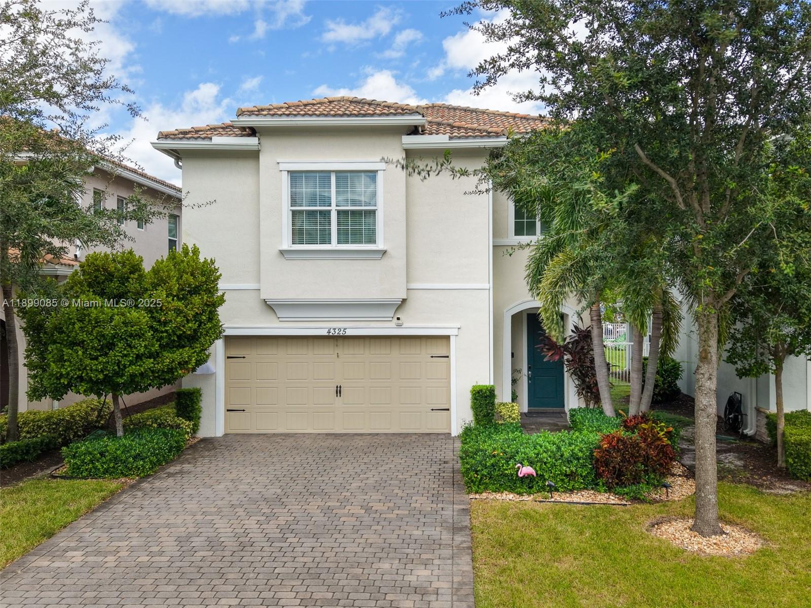 4325 Large Leaf Lane Hollywood, FL 33021 - Photo 24 of 72 a view of a house with a yard and garage
