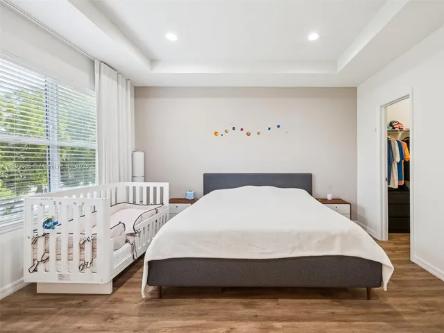 a bathroom with a sink double vanity and a mirror