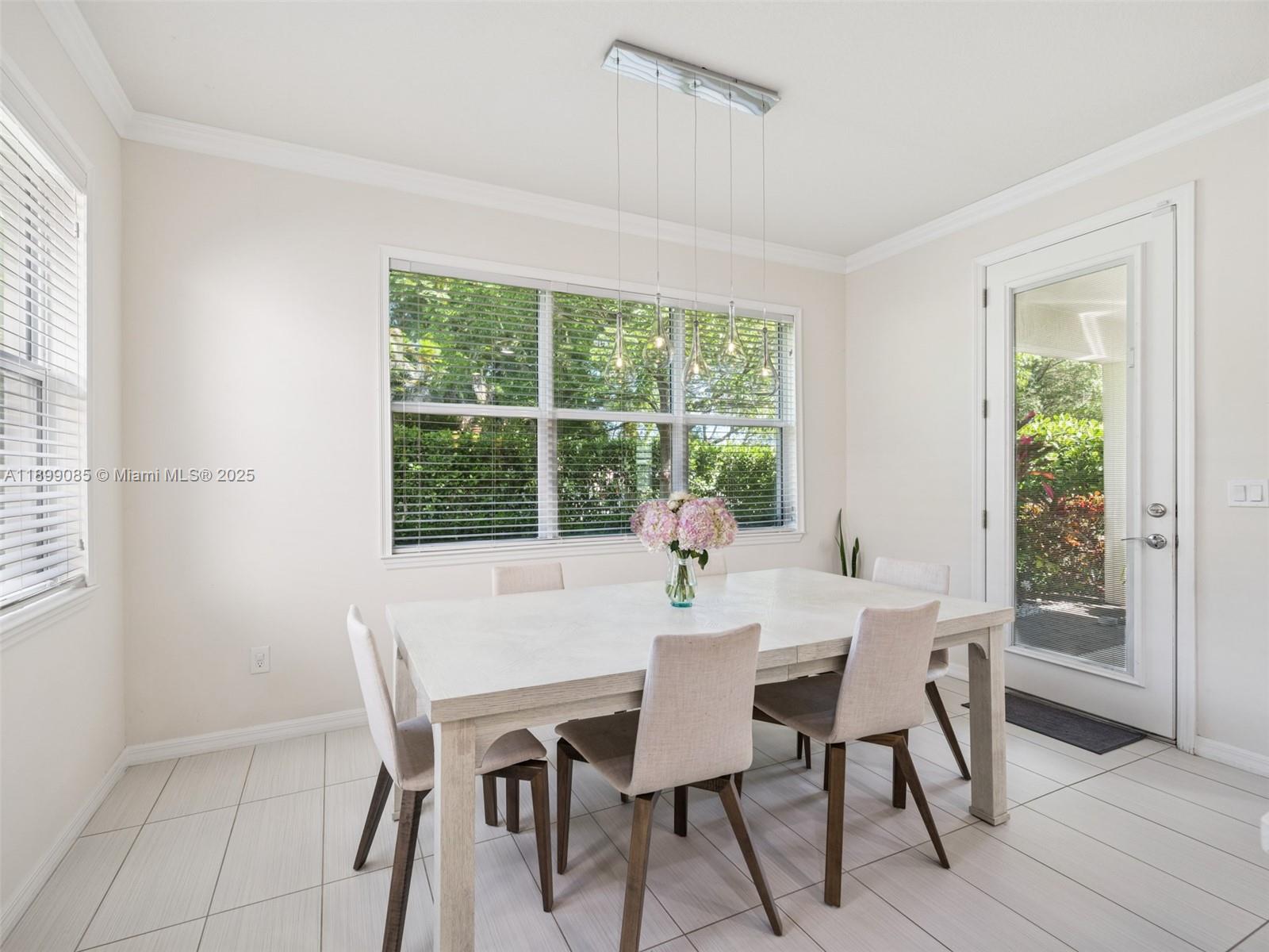 4325 Large Leaf Lane Hollywood, FL 33021 - Photo 28 of 72 a view of a dining room with furniture window and outside view