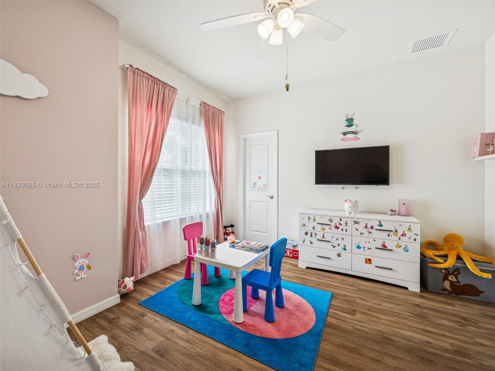 4325 Large Leaf Lane Hollywood, FL 33021 - Photo 40 of 72 a living room with furniture fireplace and flat screen tv