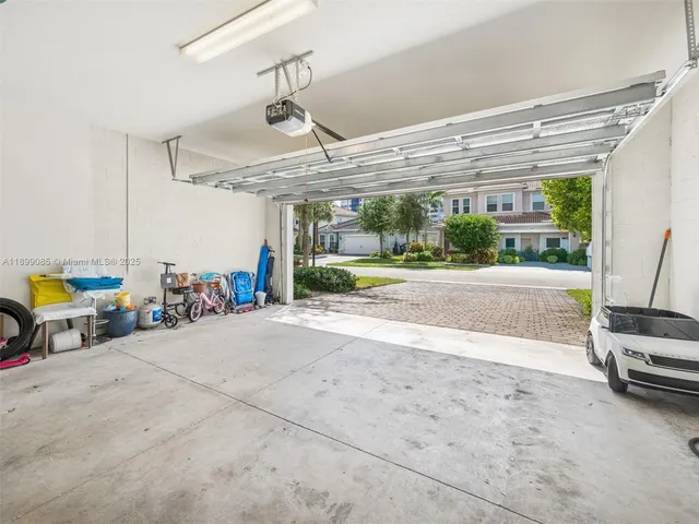 an aerial view of a house with a lake view