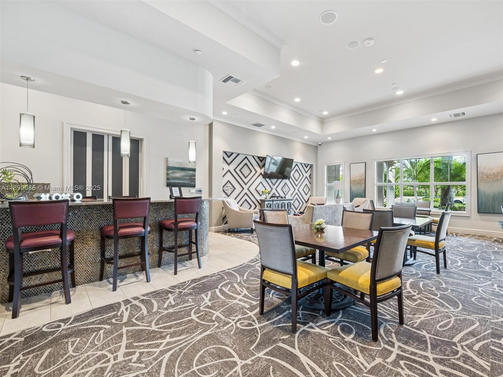4325 Large Leaf Lane Hollywood, FL 33021 - Photo 53 of 72 a living room with furniture a table and a large window