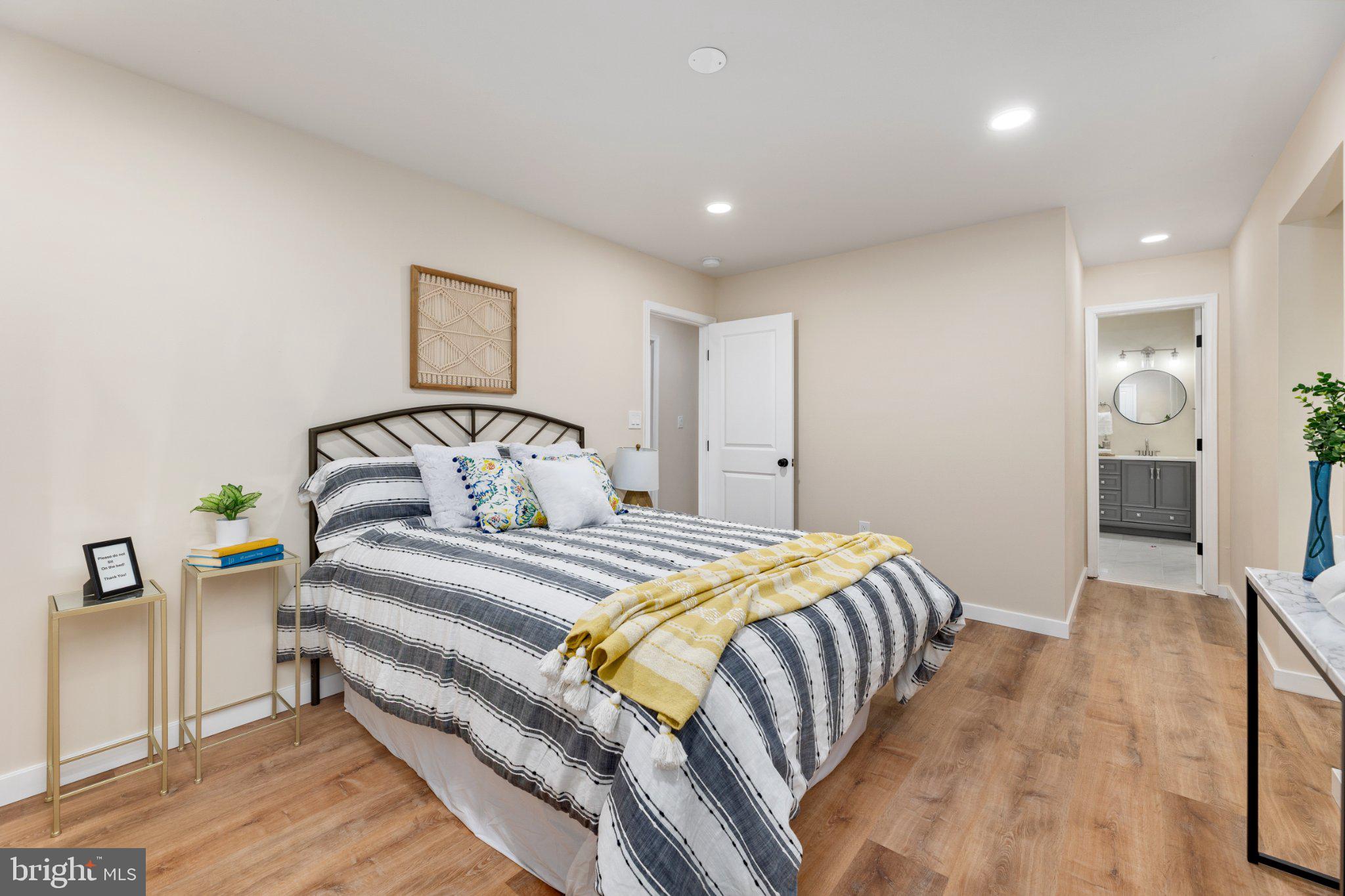 3215 Edgewood Road Kensington, MD 20895 - Photo 29 of 37 Cozy bedroom with modern charm.