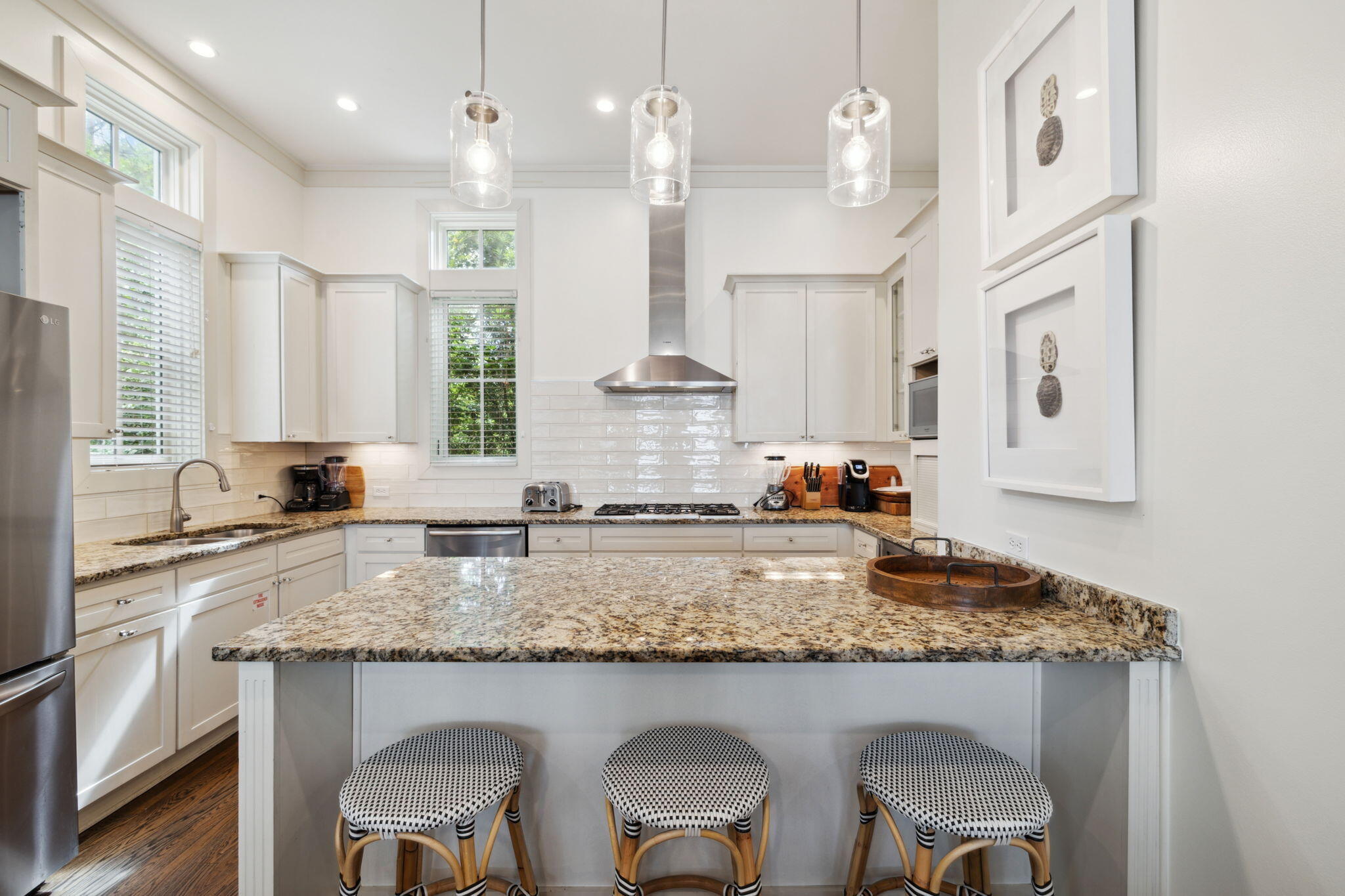 92 North Winston Lane Inlet Beach, FL 32461 - Photo 11 of 44 a kitchen with granite countertop kitchen island sink stove and cabinets