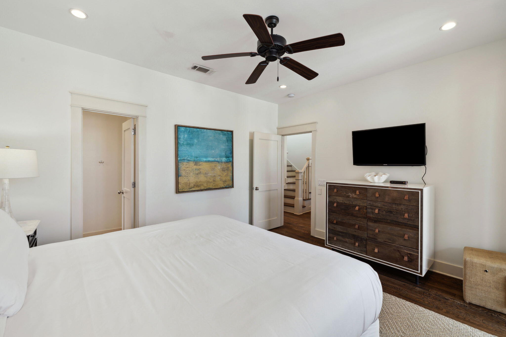 92 North Winston Lane Inlet Beach, FL 32461 - Photo 16 of 44 a bedroom with a bed and a flat screen tv