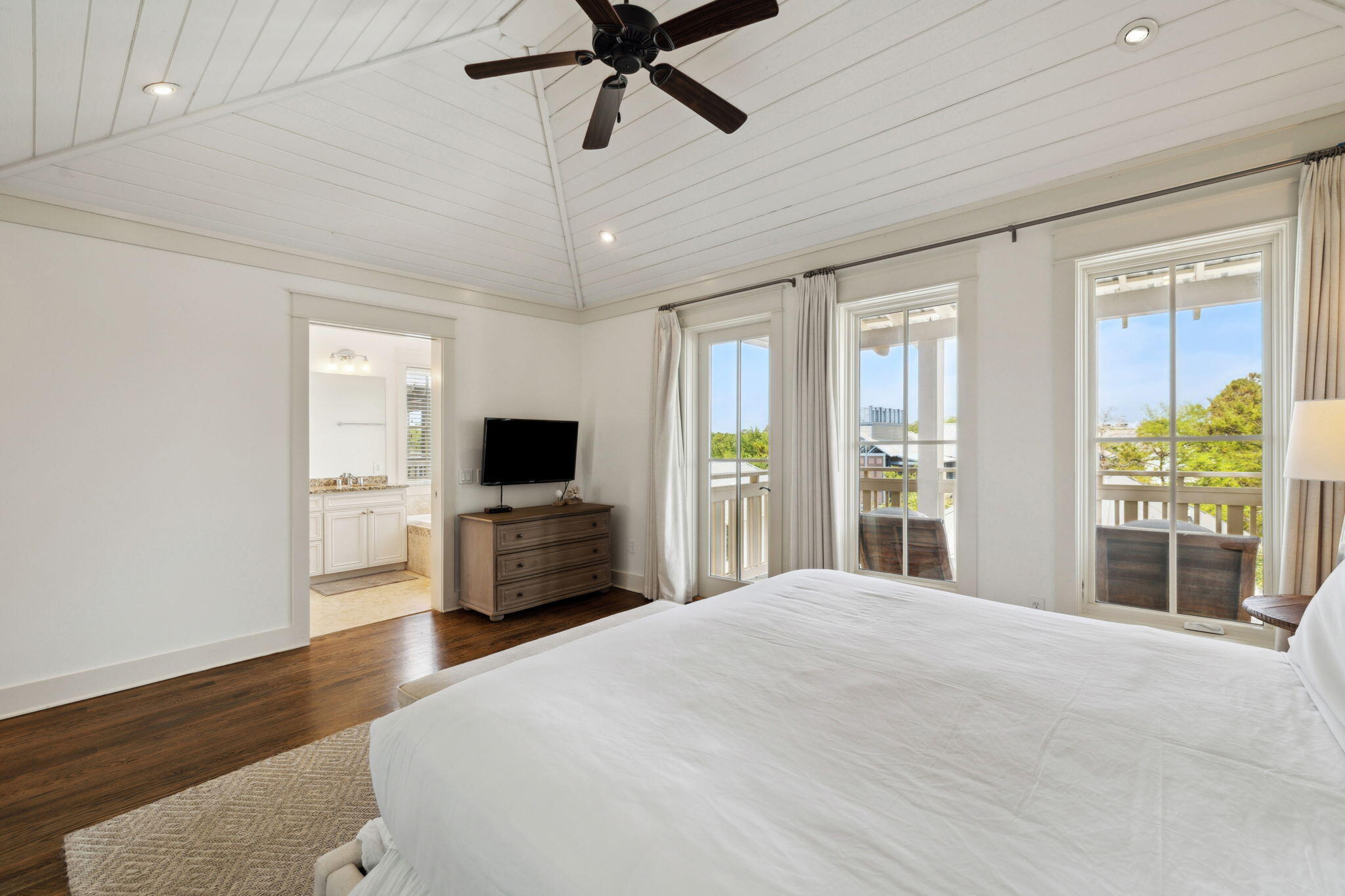 92 North Winston Lane Inlet Beach, FL 32461 - Photo 22 of 44 a bedroom with a bed and a flat screen tv