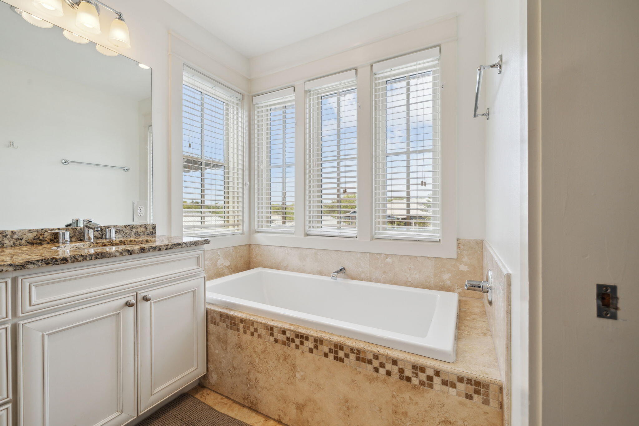 92 North Winston Lane Inlet Beach, FL 32461 - Photo 25 of 44 a bathroom with a granite countertop sink and a bathtub