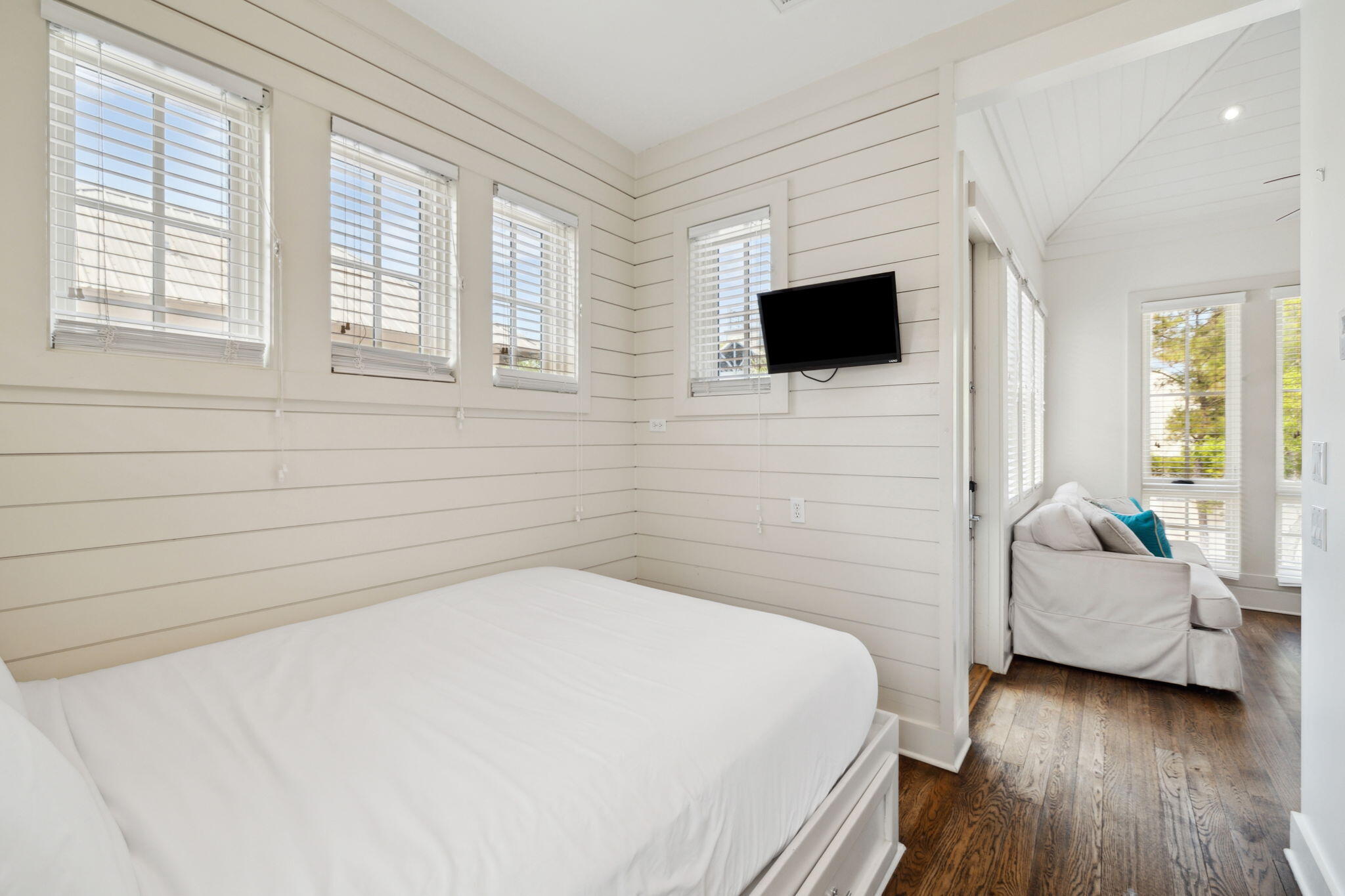 92 North Winston Lane Inlet Beach, FL 32461 - Photo 32 of 44 a bedroom with a bed and a flat screen tv