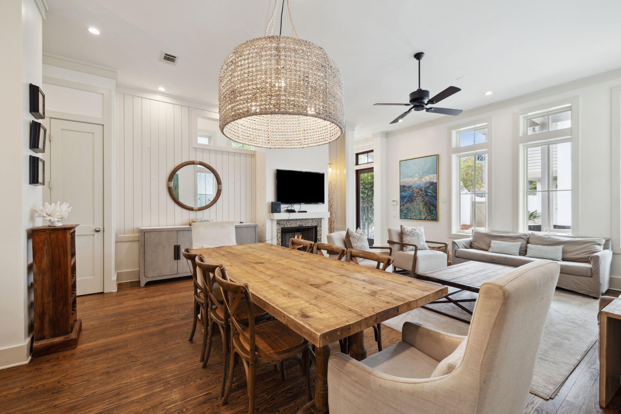 92 North Winston Lane Inlet Beach, FL 32461 - Photo 10 of 44 a view of a dining room with furniture a chandelier and wooden floor