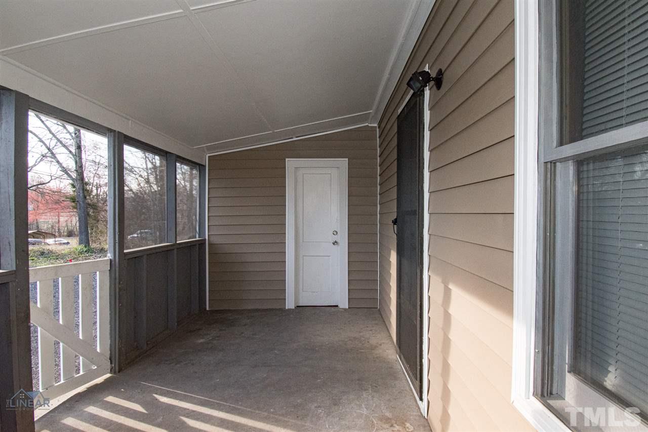 2243 Durham St Extension Burlington, NC 27217 - Photo 3 of 21 a view of front door
