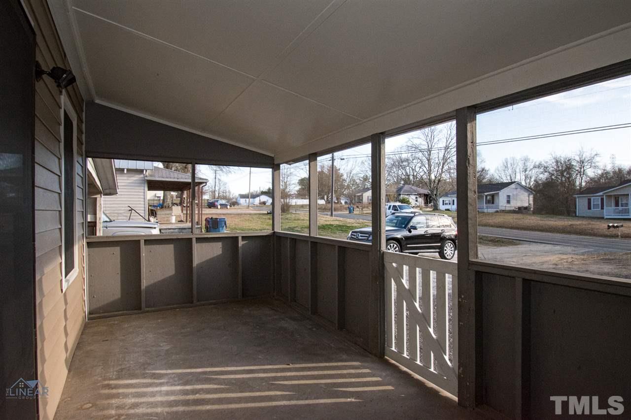 2243 Durham St Extension Burlington, NC 27217 - Photo 4 of 21 a kitchen with a sink and large window
