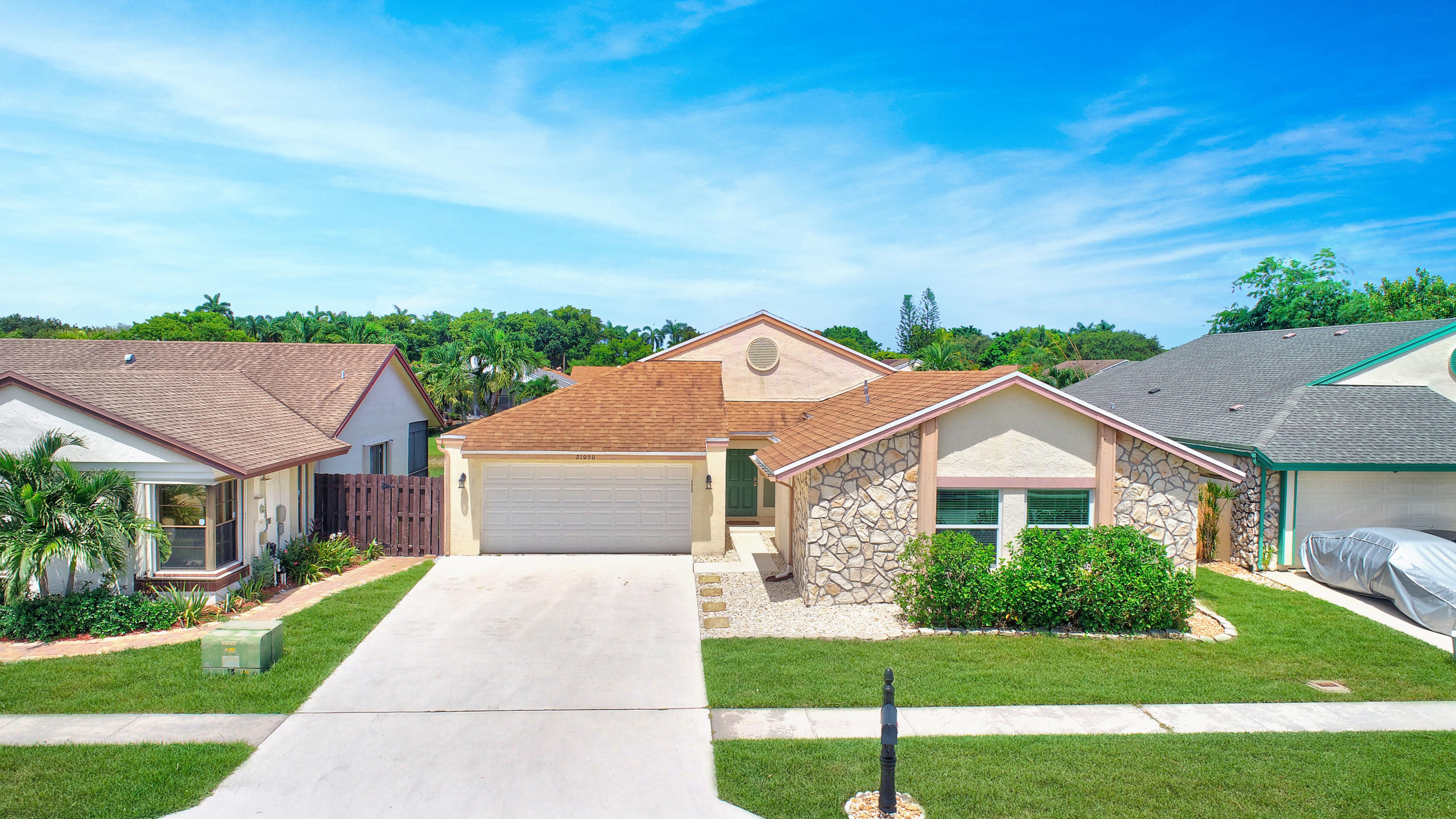 21050 Rustlewood Avenue Boca Raton, FL 33428 - Photo 1 of 44 Front
