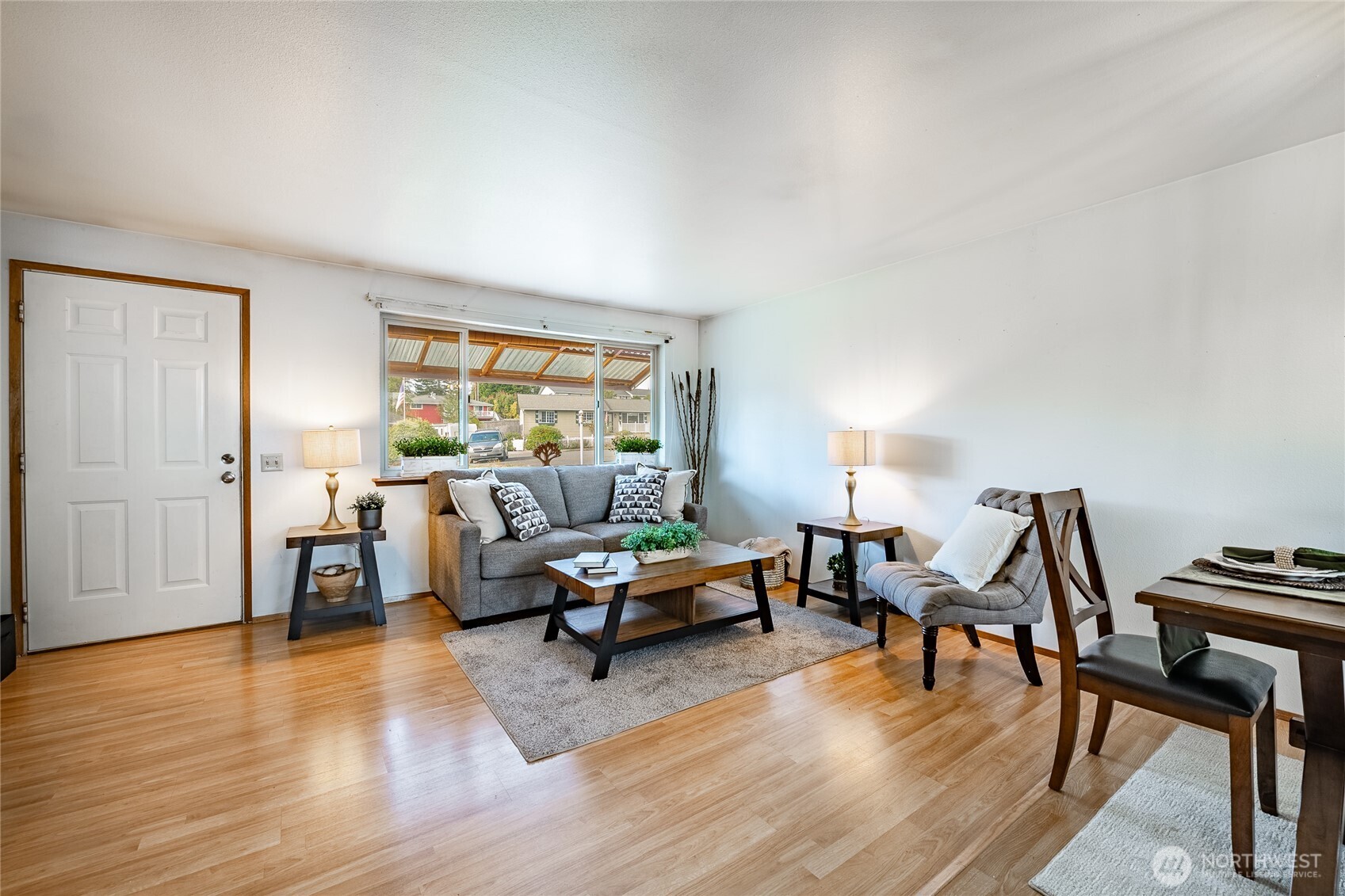 2136 Hawthorne Street Ferndale, WA 98248 - Photo 15 of 26 a living room with furniture and a wooden floor