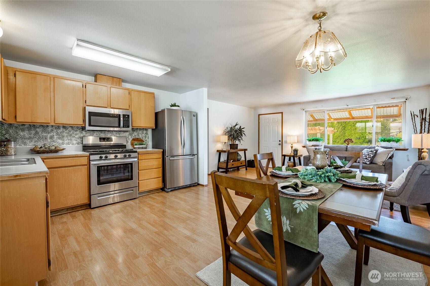 2136 Hawthorne Street Ferndale, WA 98248 - Photo 17 of 26 a kitchen with sink cabinets and stainless steel appliances