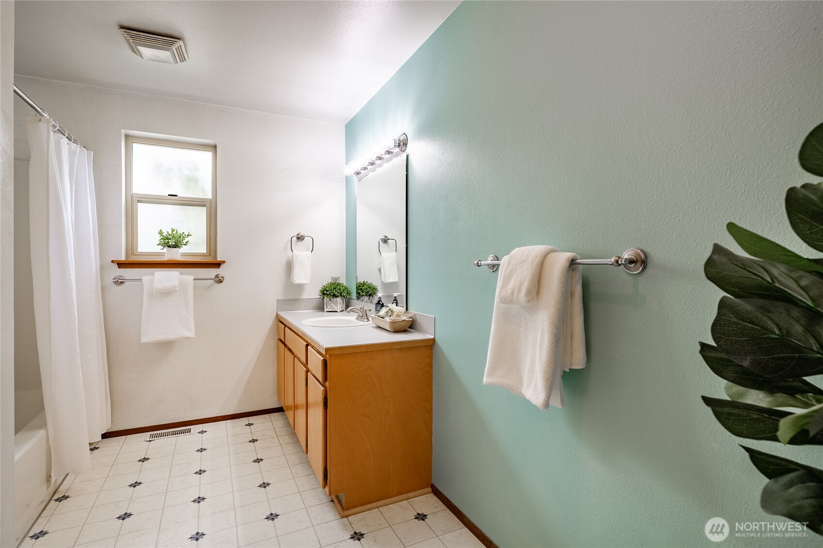 2136 Hawthorne Street Ferndale, WA 98248 - Photo 18 of 26 a bathroom with a sink and mirror