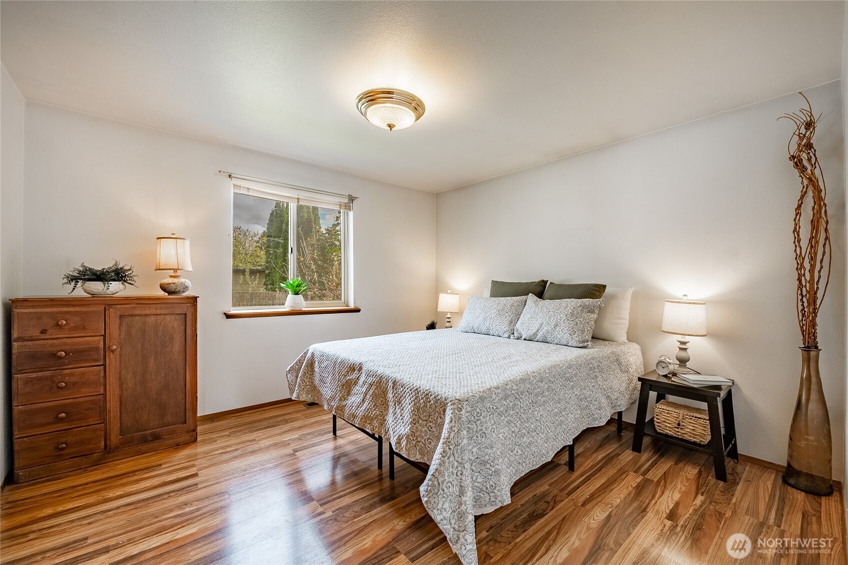 2136 Hawthorne Street Ferndale, WA 98248 - Photo 20 of 26 a bedroom with a bed and a dresser