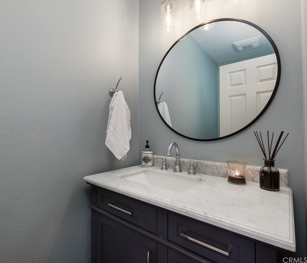 408 Richmond Street, Unit 10 El Segundo, CA 90245 - Photo 13 of 24 a bathroom with a sink and a mirror