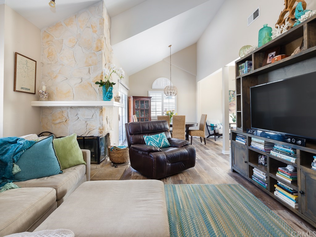 408 Richmond Street, Unit 10 El Segundo, CA 90245 - Photo 3 of 24 a living room with furniture and a flat screen tv
