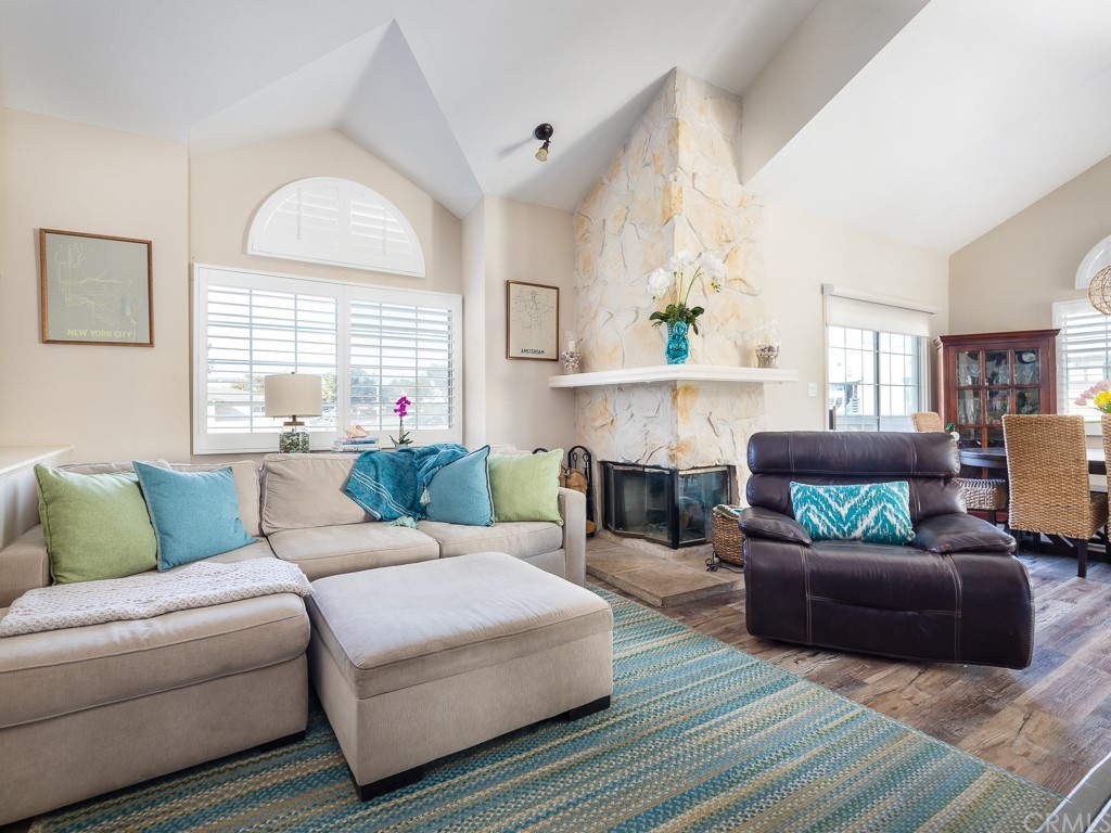 408 Richmond Street, Unit 10 El Segundo, CA 90245 - Photo 4 of 24 a living room with furniture and a fireplace