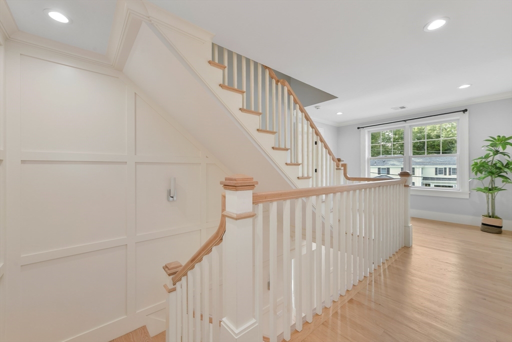 6 Norwich Road Wellesley, MA 02481 - Photo 14 of 34 a view of entryway with wooden floor and stairs
