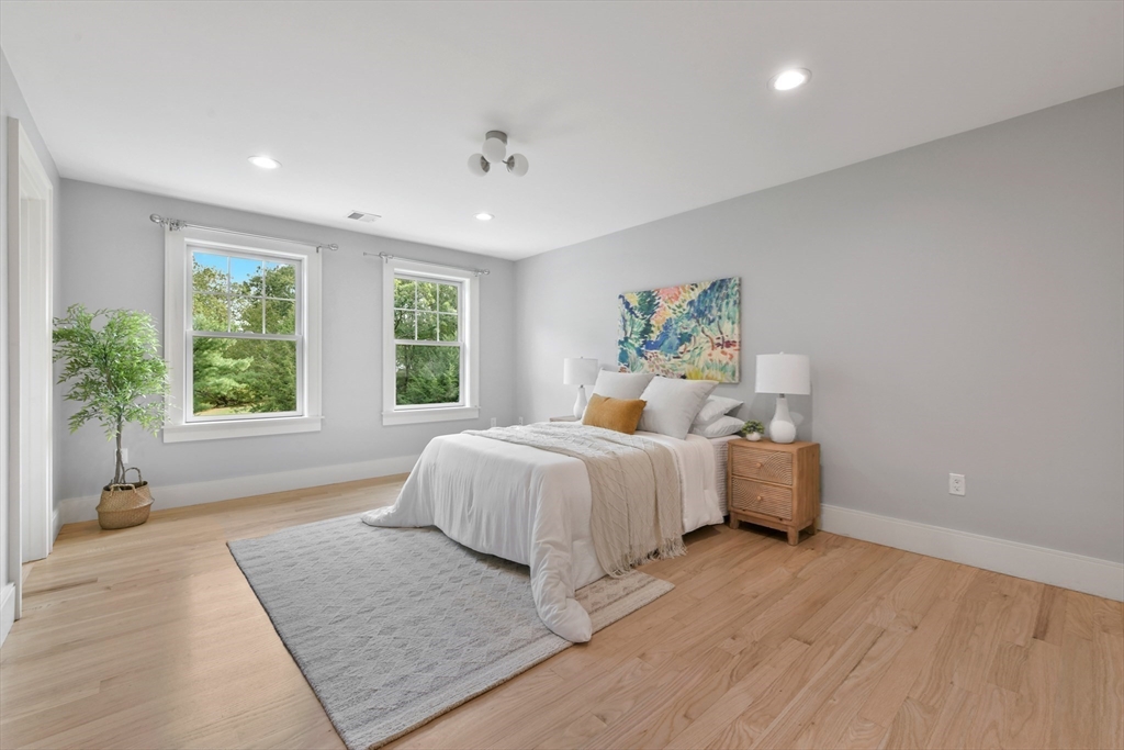 6 Norwich Road Wellesley, MA 02481 - Photo 19 of 34 a spacious bedroom with a bed and a large window