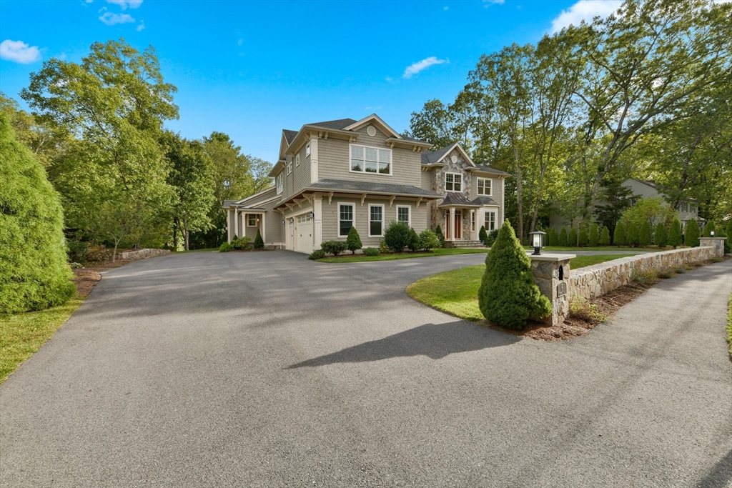 6 Norwich Road Wellesley, MA 02481 - Photo 2 of 34 a view of a house with a yard and large tree
