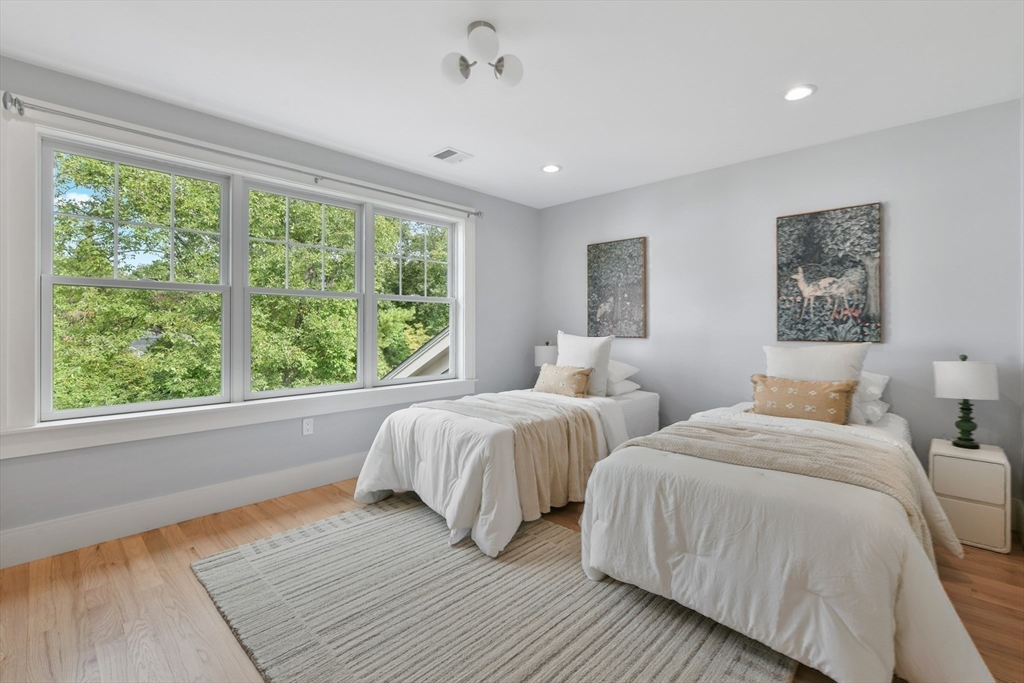 6 Norwich Road Wellesley, MA 02481 - Photo 21 of 34 a bedroom with two beds and a large window