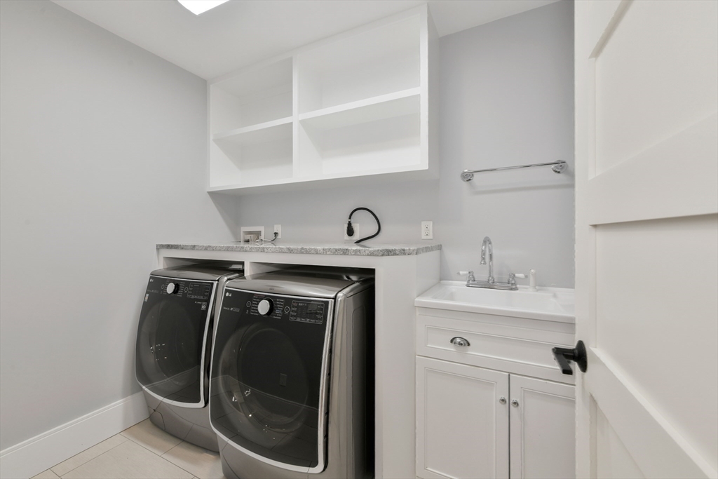 6 Norwich Road Wellesley, MA 02481 - Photo 25 of 34 a utility room with dryer and washer