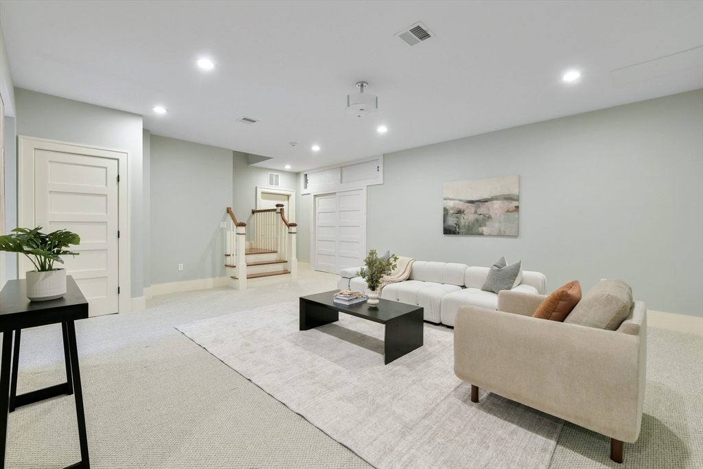 6 Norwich Road Wellesley, MA 02481 - Photo 26 of 34 a living room with furniture and a potted plant