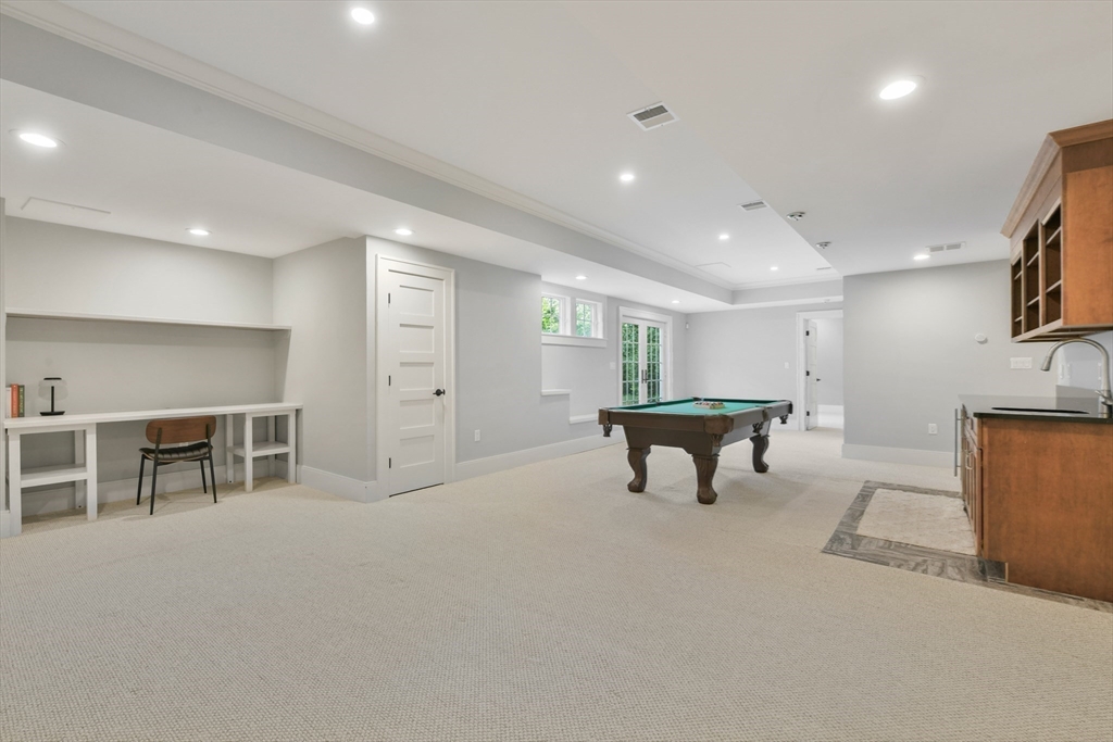 6 Norwich Road Wellesley, MA 02481 - Photo 27 of 34 a living room with furniture and a table