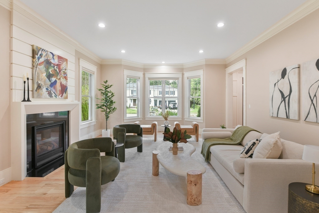 6 Norwich Road Wellesley, MA 02481 - Photo 3 of 34 a living room with furniture large window and fireplace