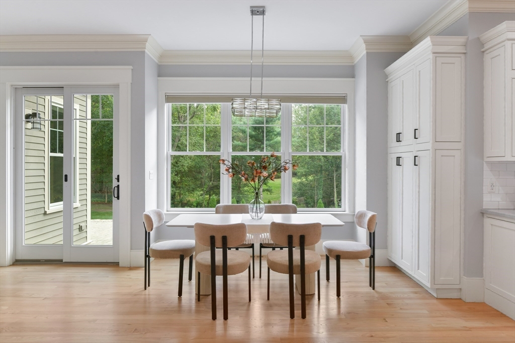 6 Norwich Road Wellesley, MA 02481 - Photo 9 of 34 a view of a dining room with furniture window and wooden floor