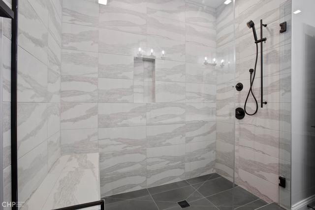 211 South Hamilton Avenue, Unit 2 Chicago, IL 60612 - Photo 14 of 22 a bathroom with a shower