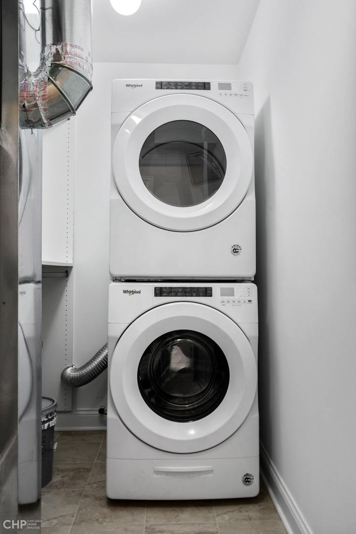 211 South Hamilton Avenue, Unit 2 Chicago, IL 60612 - Photo 19 of 22 a utility room with dryer and washer