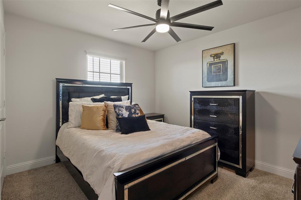 4125 Fern Loop Forney, TX 75126 - Photo 27 of 40 Recessed window with blinds, overhead ceiling fan with lighting, and light-toned wall paint