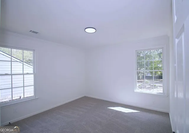 an empty room with a window
