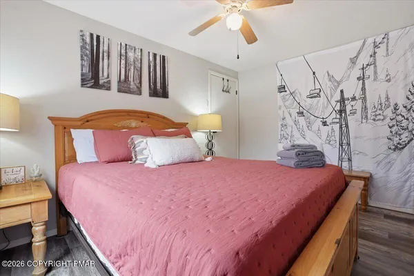 a bedroom with a bed and a closet