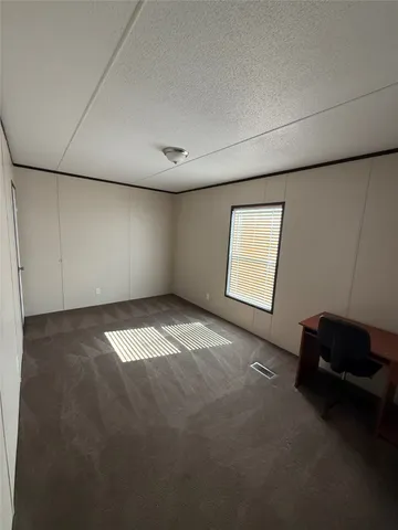 a view of a room with a window