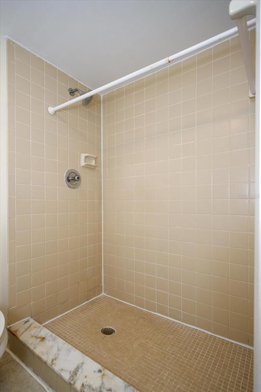 5013 Vineland Road, Unit 108 Orlando, FL 32811 - Photo 15 of 20 a bathroom with a shower