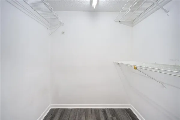 a view of a room with racks on the wall