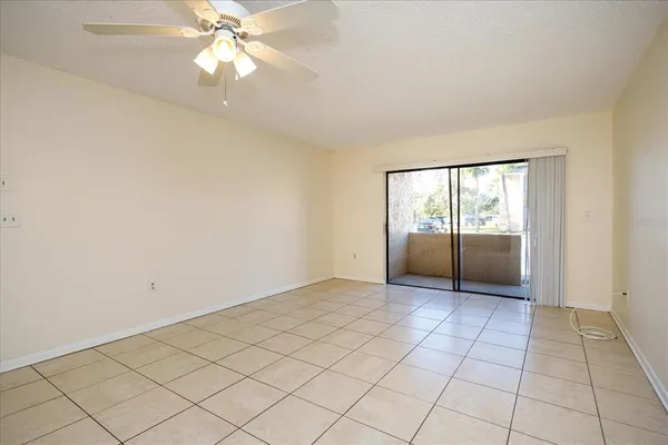 a view of an empty room and window