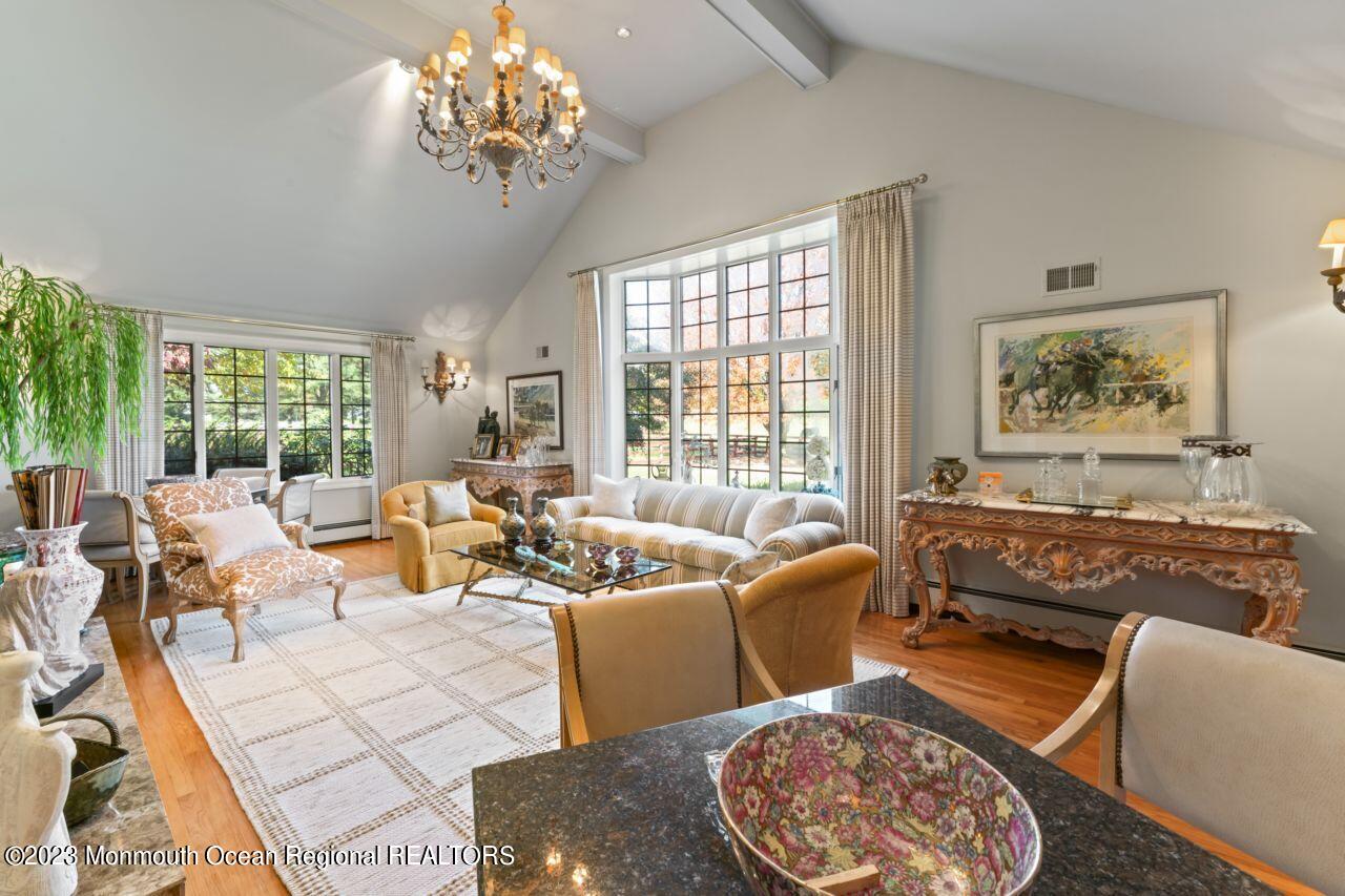 111 Muhlenbrink Road Colts Neck, NJ 07722 - Photo 33 of 73 a living room with furniture and a large window
