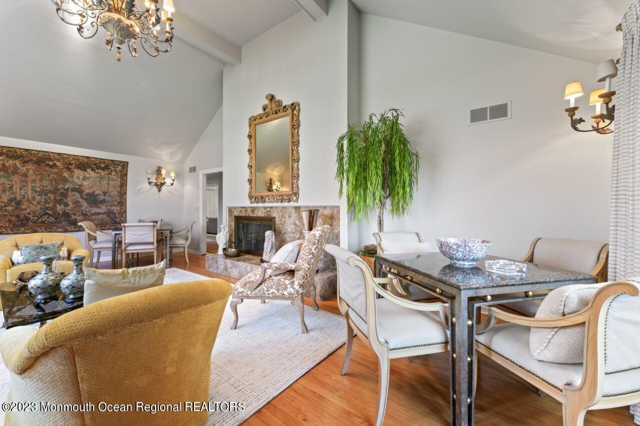 111 Muhlenbrink Road Colts Neck, NJ 07722 - Photo 35 of 73 a living room with furniture and a large window