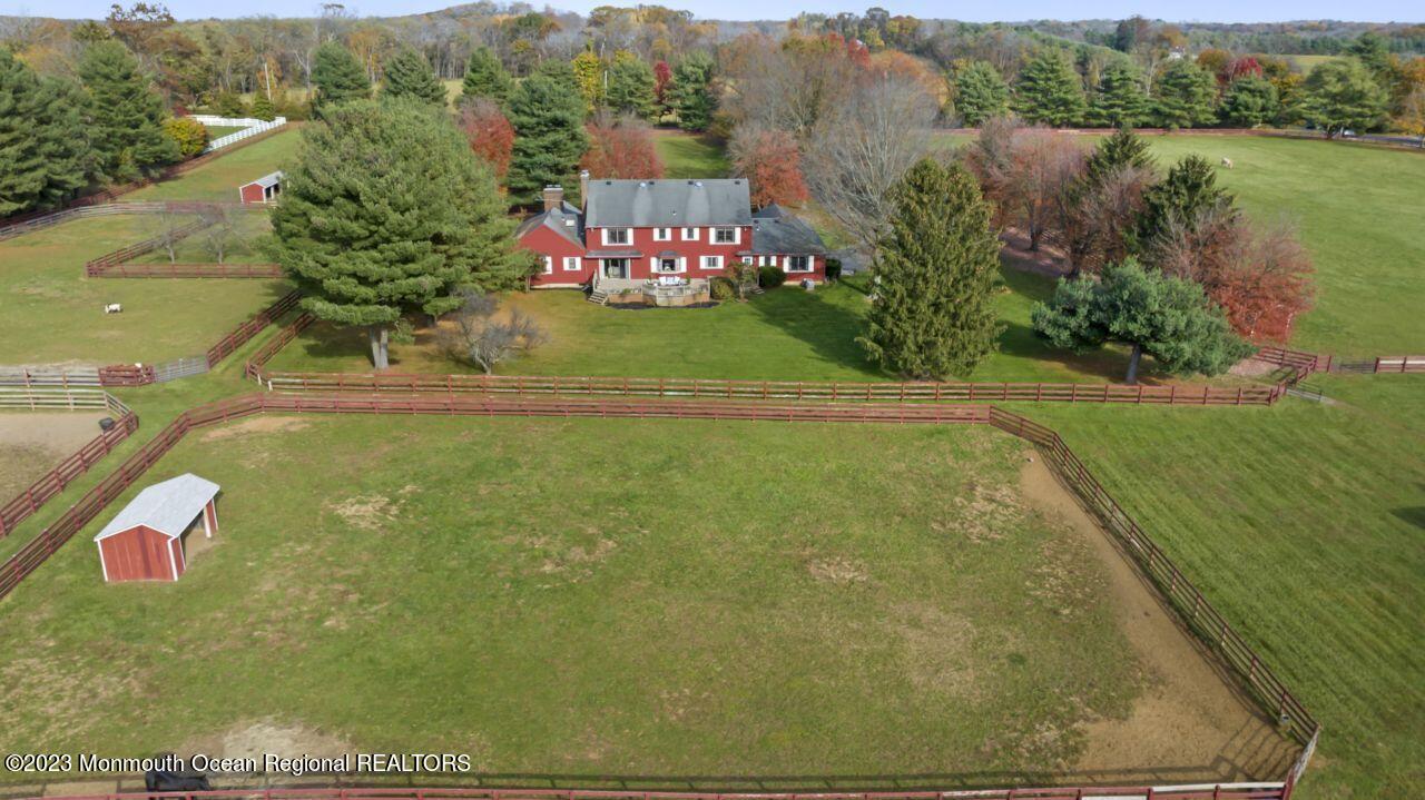 111 Muhlenbrink Road Colts Neck, NJ 07722 - Photo 6 of 73 an aerial view of residential houses with outdoor space and river