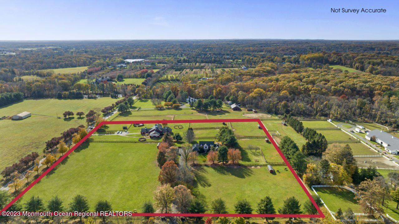 111 Muhlenbrink Road Colts Neck, NJ 07722 - Photo 7 of 73 an aerial view of a residential houses with outdoor space and swimming pool