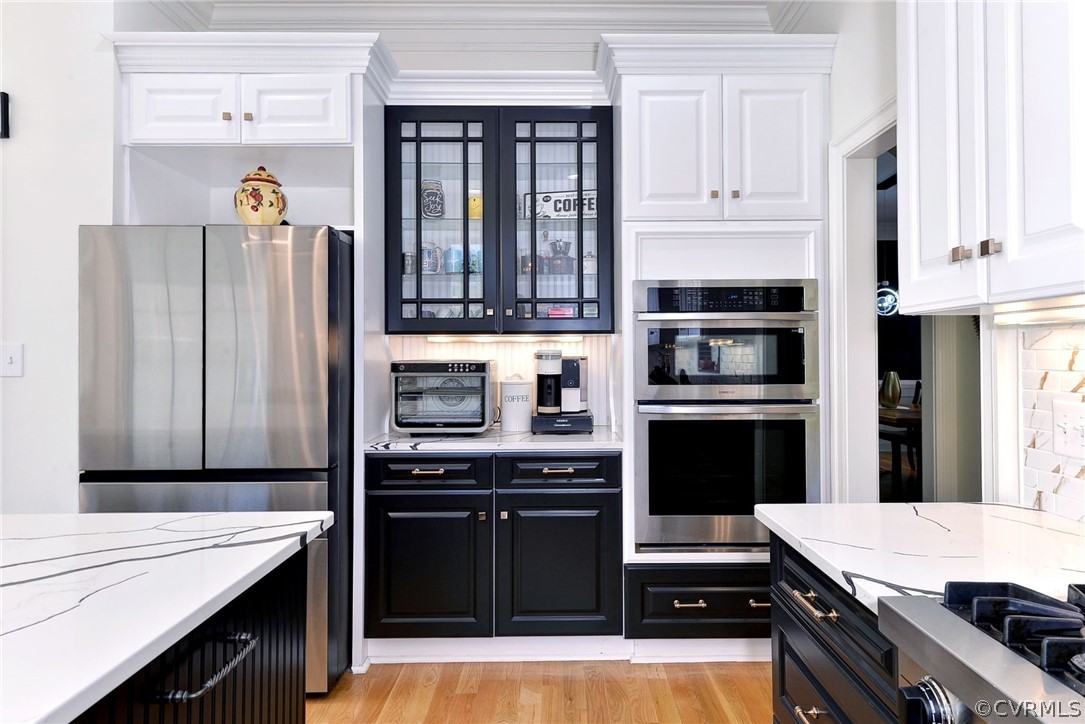 205 Portmarnoch Williamsburg, VA 23188 - Photo 11 of 49 a kitchen with a sink stove and refrigerator