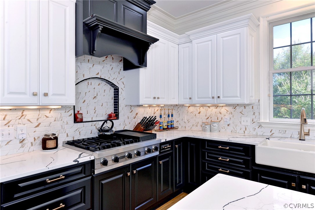205 Portmarnoch Williamsburg, VA 23188 - Photo 12 of 49 a kitchen with stainless steel appliances a sink and a stove