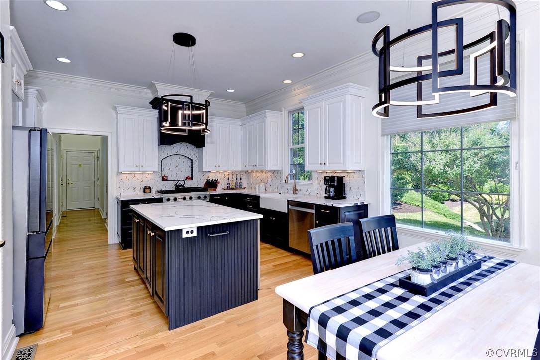 205 Portmarnoch Williamsburg, VA 23188 - Photo 13 of 49 a kitchen that has a sink and a stove in it