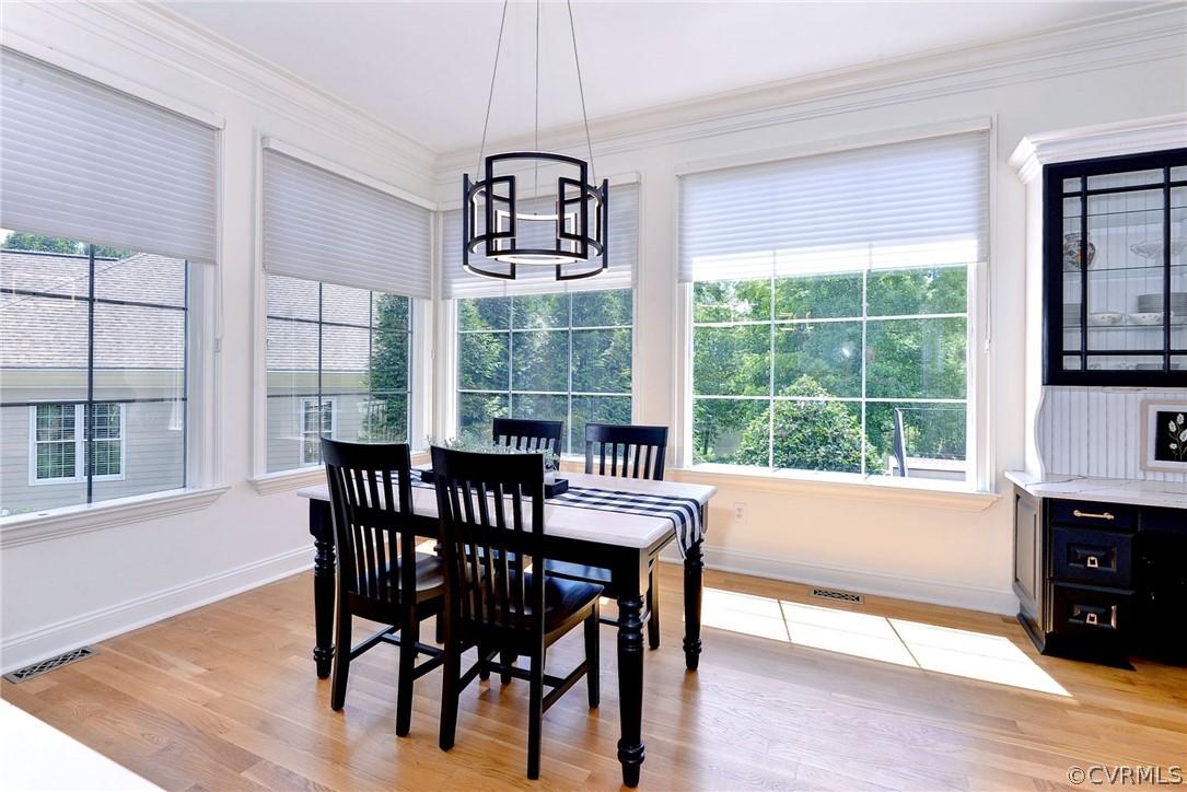 205 Portmarnoch Williamsburg, VA 23188 - Photo 16 of 49 a view of a dining room with furniture window and outside view