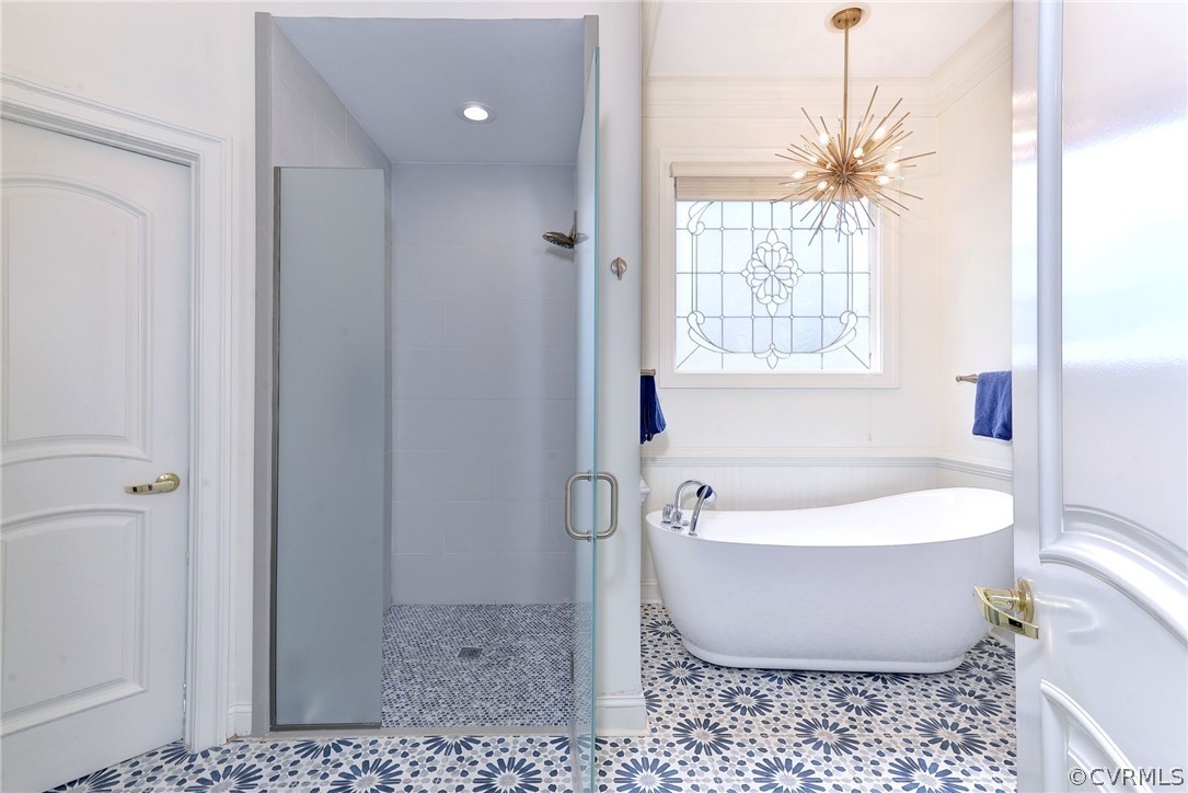 205 Portmarnoch Williamsburg, VA 23188 - Photo 22 of 49 a white bath tub sitting in a bathroom next to a window